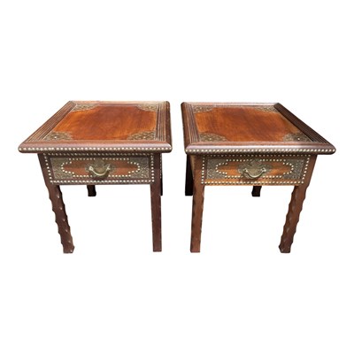 Lot 104 - A pair of reproduction hardwood coffee tables...
