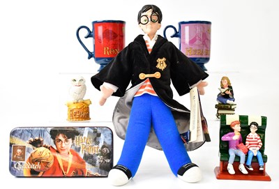 Lot 422 - HARRY POTTER; a collection of items including...