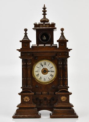 Lot 336 - A German cuckoo clock, with white dial set...