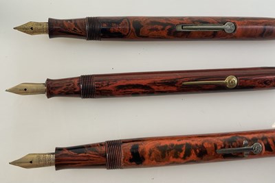 Lot 60 - CONWAY STEWART; two fountain pens, each having...
