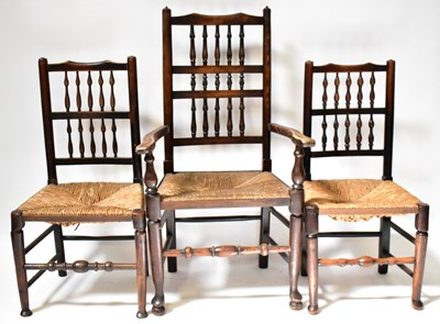 Lot 153 - An early 19th century rush seated spindle back...
