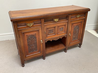 Lot 254 - An Edwardian mahogany carved sideboard, height...