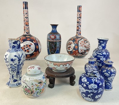 Lot 33 - A pair of Imari bulbous vases, and a cloisonné...