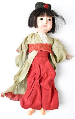 Lot 494 - A Japanese composite jointed doll, with...