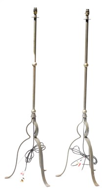 Lot 200 - A pair of metal standard lamps with knopped...