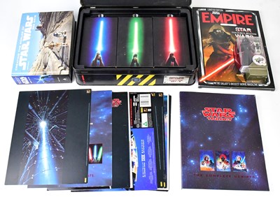 Lot 449 - STAR WARS; a collection of videos, CDs, Tazzo...