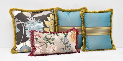 Lot 26 - Three teal cushions with green trim, and one...