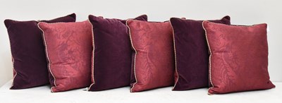 Lot 5 - Burgundy jacquard and red velvet cushions (6)
