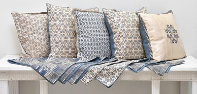 Lot 6 - Five tan and blue cushions and bag covers (6)