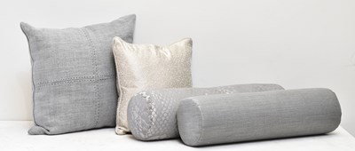 Lot 24 - DE LA CUONA; a grey cushion and three others (4)