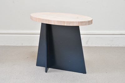 Lot 63 - A contemporary side table with oval limed oak...
