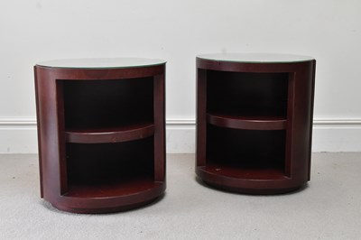 Lot 70 - A pair of contemporary leather oval bedside...