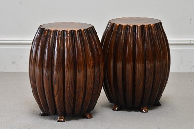 Lot 64 - A pair of contemporary elm barrel garden seats...