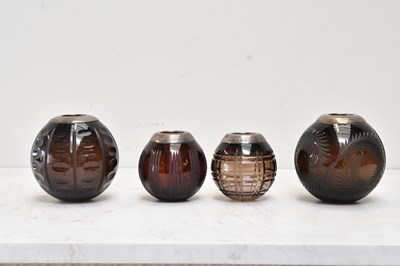 Lot 112 - Four contemporary brown glass candle holders...