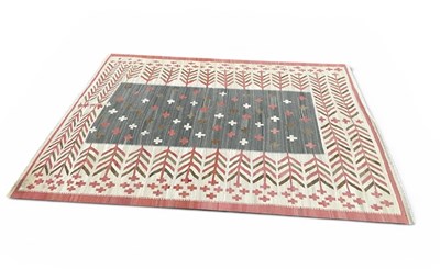 Lot 22 - A contemporary rug stylised decoration in...