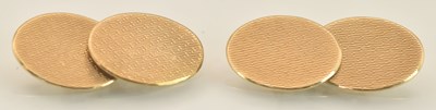 Lot 1377 - A pair of 9ct yellow gold oval cufflinks, with...