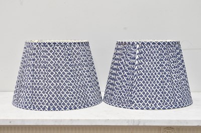 Lot 101 - Two contemporary conical lamp shades, with...