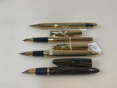 Lot 90 - SHEAFFER; a collection of four pens comprising...