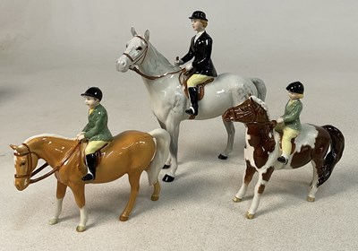 Lot 351 - BESWICK; three figures comprising a lady rider...
