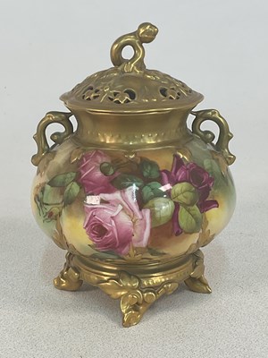 Lot 245 - ROYAL WORCESTER; a pot pourri jar and cover...