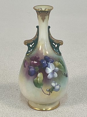 Lot 308 - ROYAL WORCESTER; twin handled vase decorated...