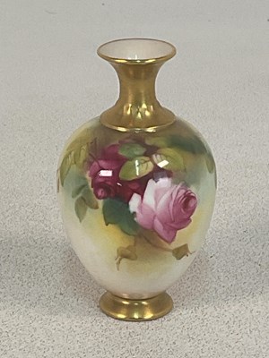 Lot 310 - ROYAL WORCESTER; a Hadley vase with roses and...