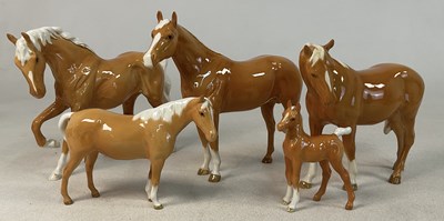 Lot 337 - BESWICK; a collection of five Palomino horses,...