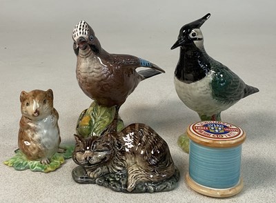 Lot 349 - BESWICK; a collection of four figures...