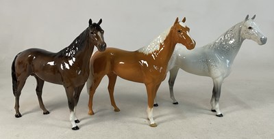 Lot 339 - BESWICK; a collection of three horses...