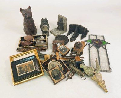 Lot 100 - A cast metal clock in the form of an owl, a...