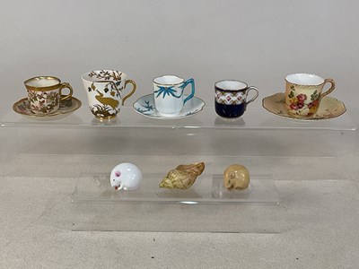 Lot 267 - ROYAL WORCESTER; five cups and three saucers,...