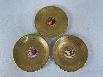 Lot 268 - ROYAL WORCESTER; three handpainted and gilded...