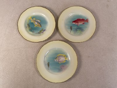 Lot 269 - ROYAL WORCESTER; three handpainted plates,...