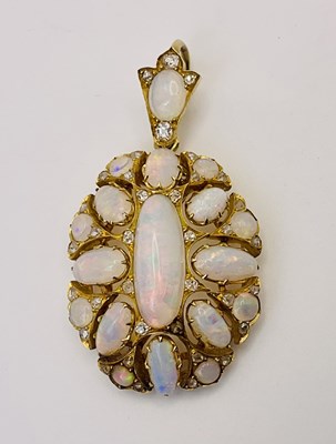 Lot 635 - A late 19th/early 20th yellow metal opal and...
