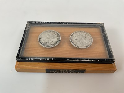 Lot 555 - Two coins comprising a Victorian one rupee,...