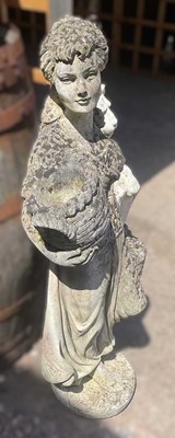 Lot 895 - A reconstituted concrete girl with basket,...