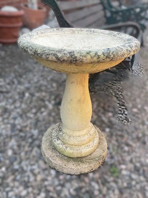 Lot 894 - A reconstituted concrete bird bath; with moon...