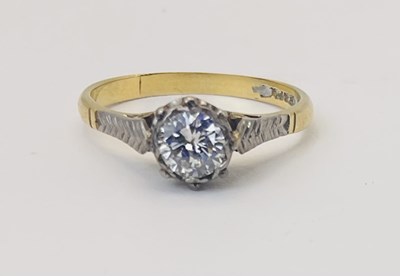 Lot 640 - A 18ct yellow gold and platinum diamond...