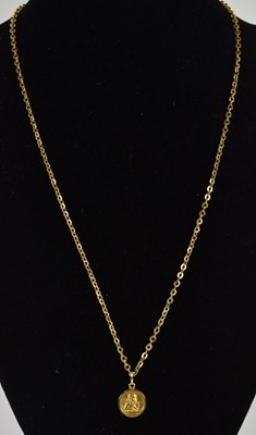 Lot 1303 - An 18ct yellow gold necklace, with small...