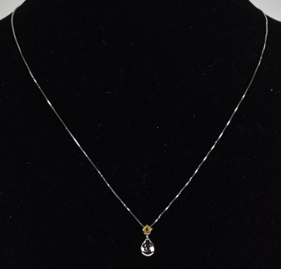 Lot 1323 - An 18ct white gold dainty necklace, with...