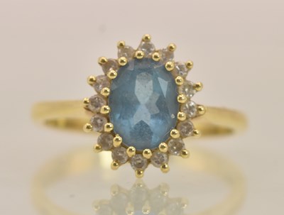 Lot 1216 - An 18ct yellow gold dress ring, with central...