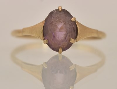 Lot 1286 - A 9ct yellow gold amethyst set dress ring, the...