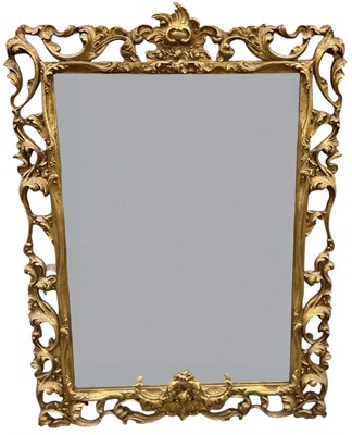 Lot 63 - An early 20th century ornately gilt framed...