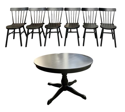 Lot 10 - A modern contemporary ebonised circular...
