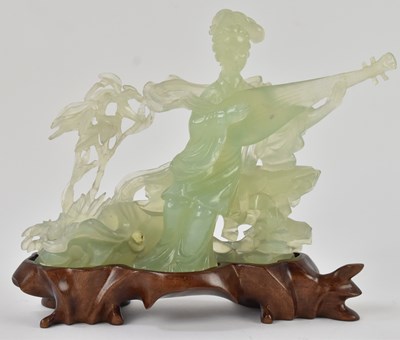 Lot 1000 - An early 20th century Chinese carved green...