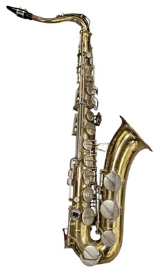 Lot 416 - A Corton base saxophone with stand, overall...