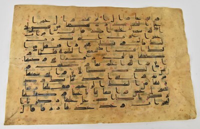 Lot 1003 - A large Islamic Quran Kufic page on vellum, 42...