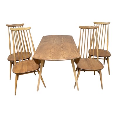 Lot 10 - ERCOL; a drop-leaf table, height 70cm, length...
