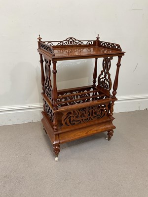 Lot 137 - A Victorian figured walnut Canterbury whatnot,...