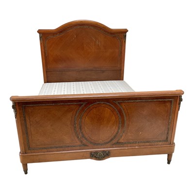 Lot 145 - A Louis XVI style French oak and gilt brass...